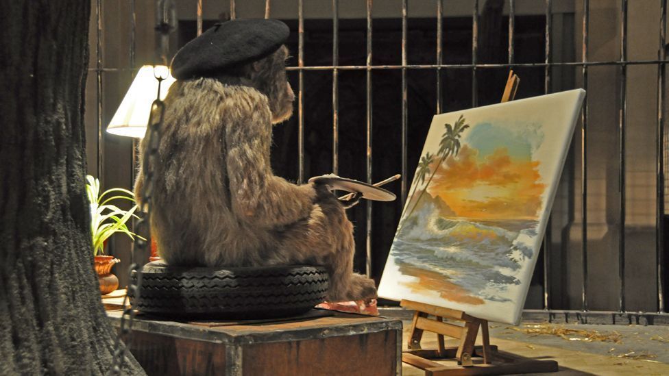 Gorilla trying to create art